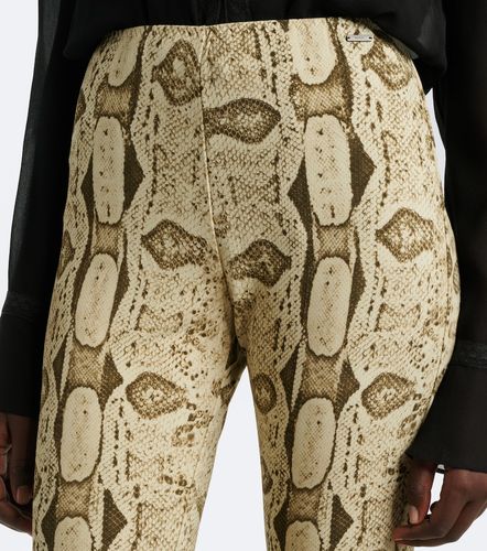 Pantalon ajusté à imprimé serpent - Gucci - Modalova