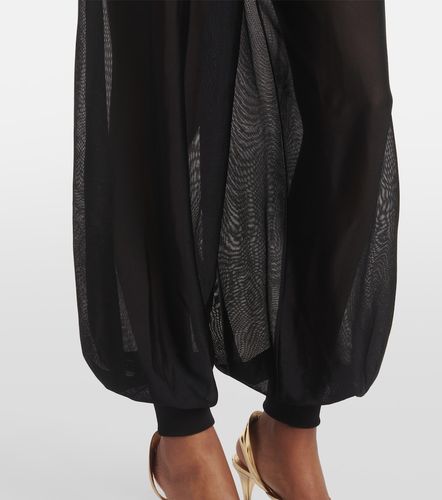 Alaïa Pantalon ample à taille haute - Alaia - Modalova