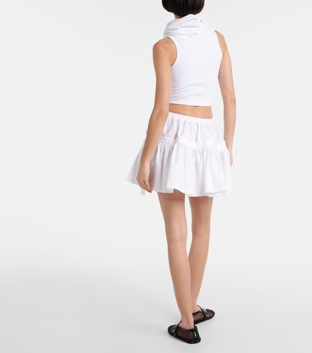 Alaïa Mini-jupe à volants et nœud - Alaia - Modalova