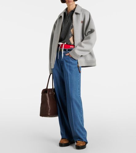 Bottines Chunky en cuir et shearling - Miu Miu - Modalova