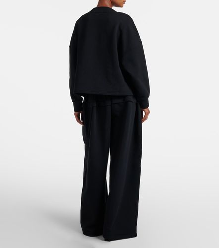 Alaïa Pantalon de survêtement ample en coton - Alaia - Modalova