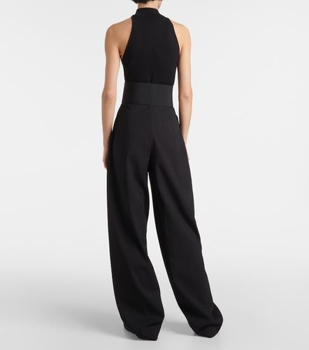 Alaïa Pantalon ample taille haute en laine - Alaia - Modalova