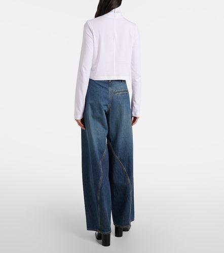 Alaïa Top raccourci à col roulé en coton - Alaia - Modalova