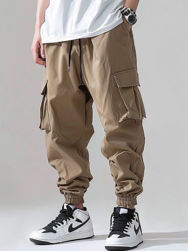 Pantalon cargo à poches solidess avec cordon de serrage à la taille et pieds liés - Newchic - Modalova