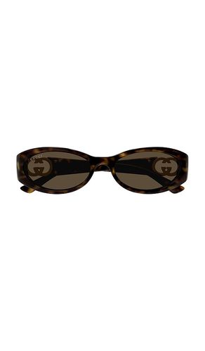 Gucci LUNETTES DE SOLEIL en Brown - Gucci - Modalova