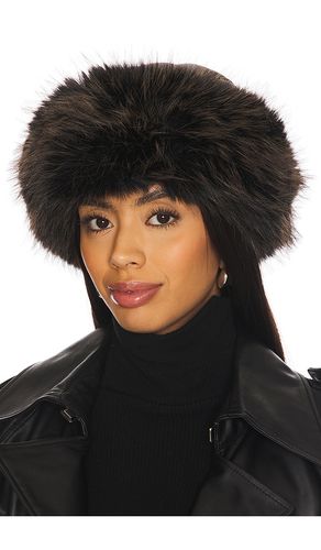 Faux Shearling Roller Hat en - jocelyn - Modalova