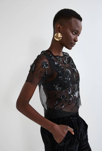 Top manches courtes avec détails en sequins et perles en polyester recyclé - MONOPRIX - Modalova