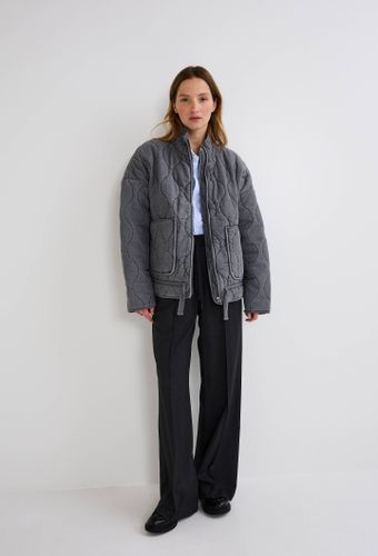 Veste matelassé denim poches plaquées - MONOPRIX - Modalova